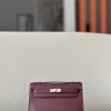 Kelly Pochette Swift Rouge H (55) Palladium Hardware