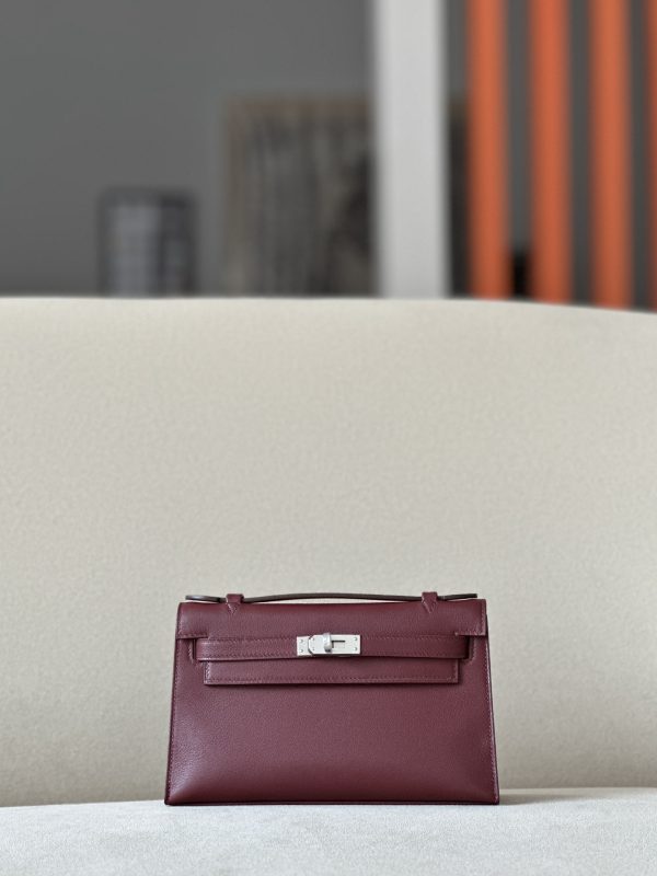 Kelly Pochette Swift Rouge H (55) Palladium Hardware